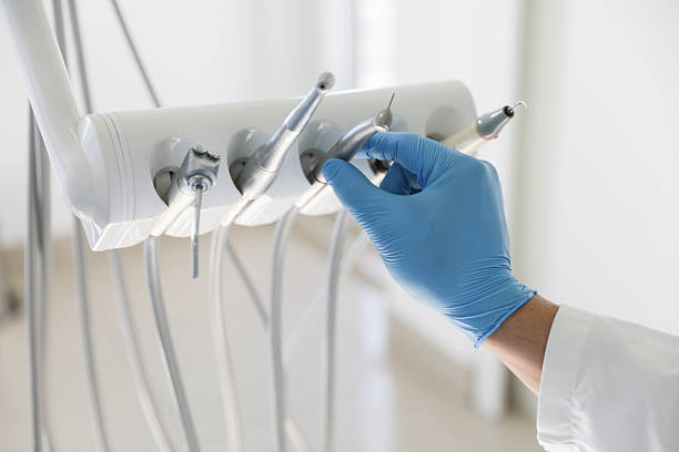 Professional Tooth Extraction technician working in Wellington, TX